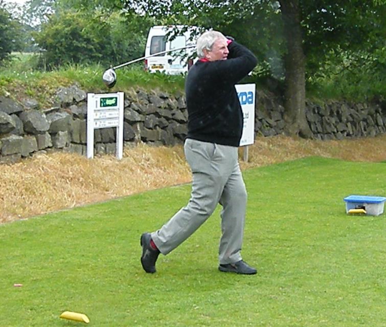 David showing his golfing skills at one of his golf days